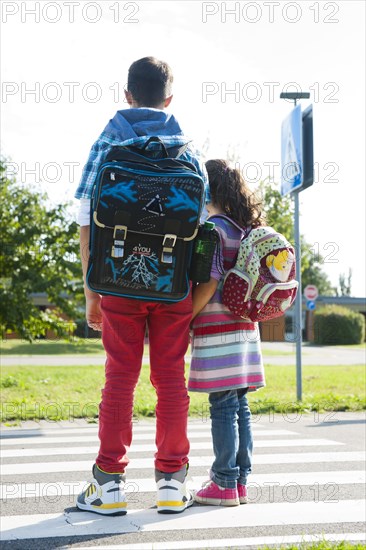 Children crossing a zebra crossing