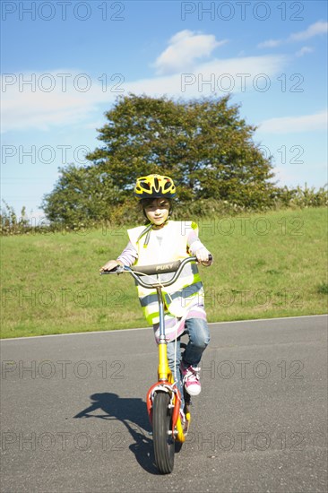 Girl riding a scooter