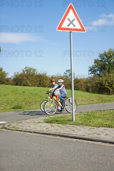 Children on bicycles at a traffic awareness course