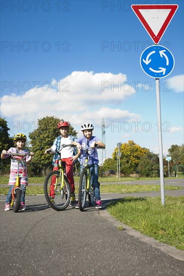 Children on bicycles at a traffic awareness course