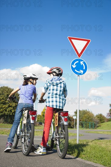 Children on bicycles at a traffic awareness course