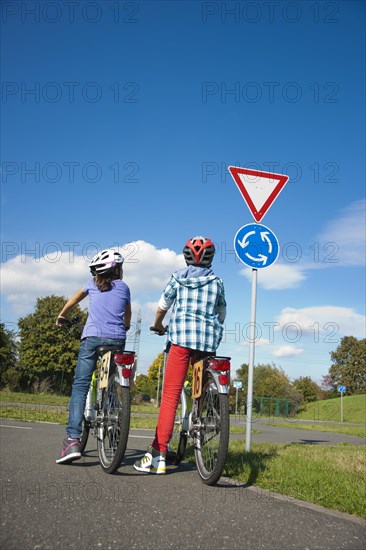 Children on bicycles at a traffic awareness course