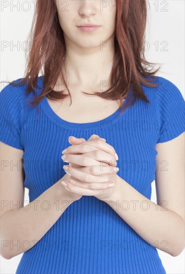 Young woman praying