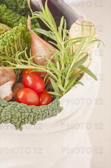 Environmentally friendly shopping bag filled with vegetables