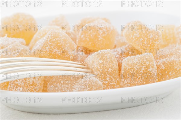 Dried ginger coated with sugar