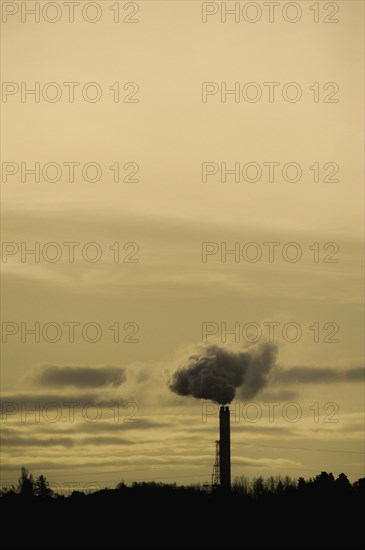 Smokestack against sky