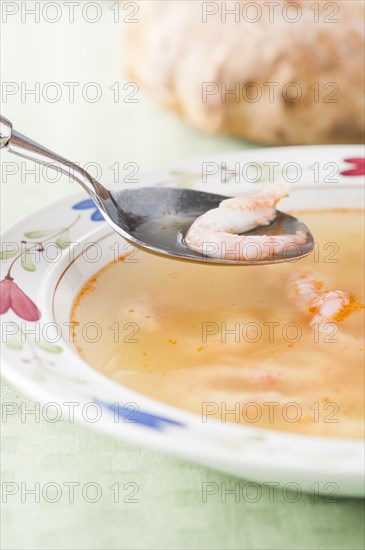 Bowl of soup with prawns