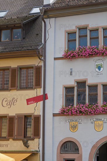 Cafe and the Town Hall with cracks in the facade due to geothermal drilling