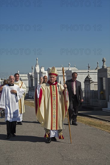 Archbishop Gregory Aymond leads the Blessing of the Graves at St. Louis #3 Cemetery on All Saints Day