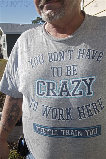 Man wearing a T-shirt with the message