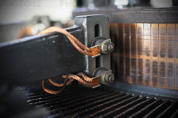 Close-up of the carbon brushes and the collector of an alternator