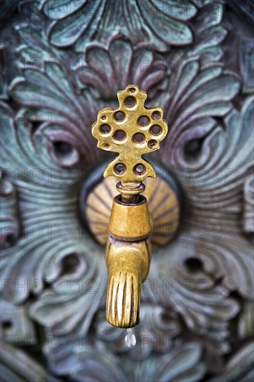 Brass faucet at the German Fountain