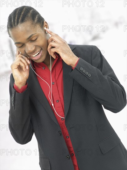 Young man listening to music