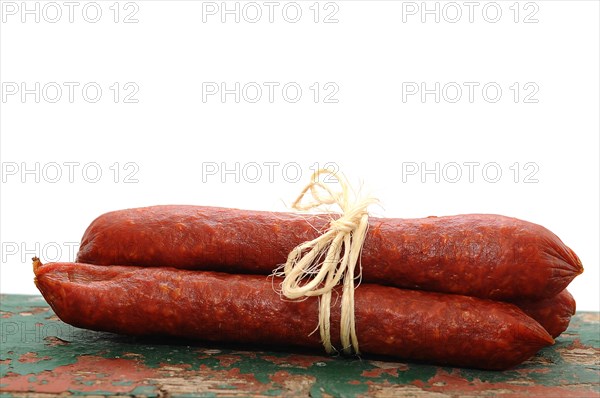 Three salami tied together