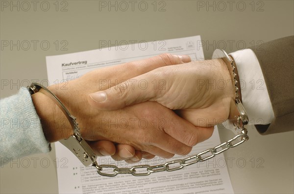 Handshake with tied hands