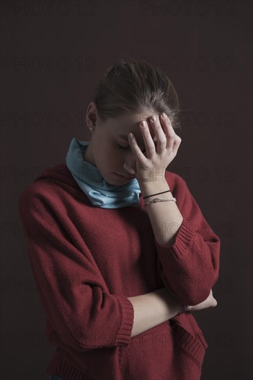 Teenage girl with a thoughtful expression