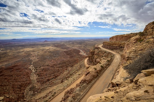 Moki Dugway leads in serpentines through the steep face of the Cedar Mesa