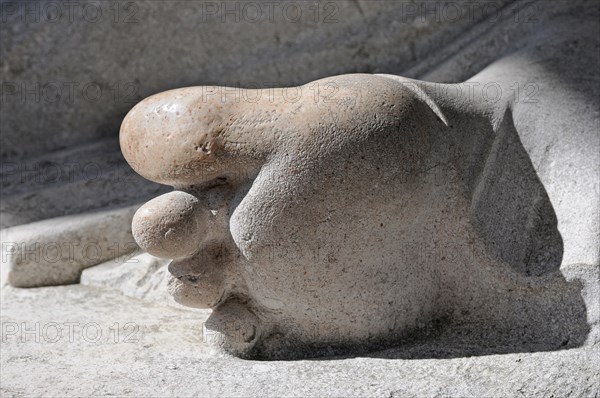 Detailed view of the foot of a sculpture