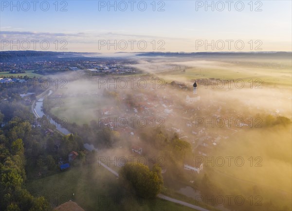 Place Gelting and Loisach canal in the fog at sunrise