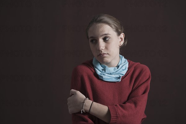 Teenage girl with a thoughtful expression