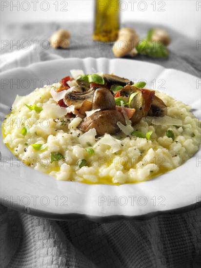 Classic risotto with wild porcini mushrooms and bacon