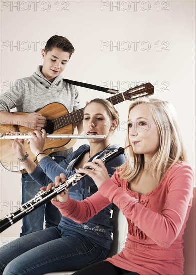 Teenagers making music together