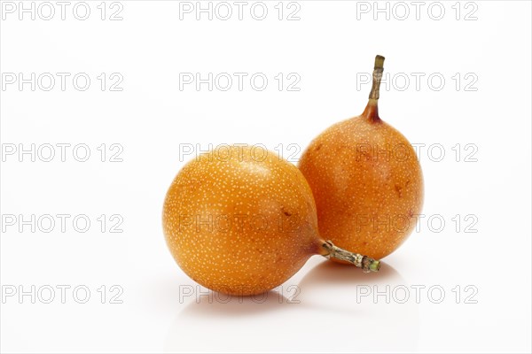 Two Granadillas or Passion Fruit (Passiflora caerulea)