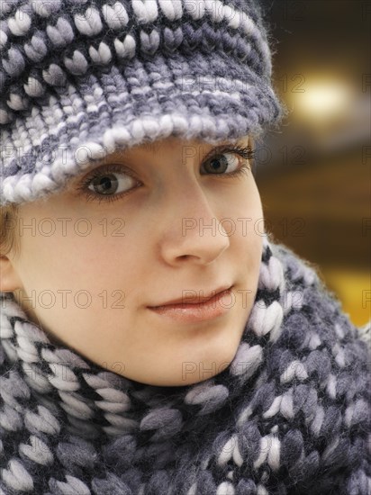 Girl wearing a hat and a scarf