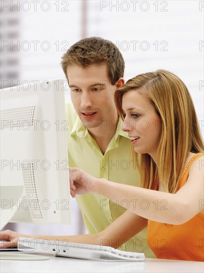 Young couple using a computer