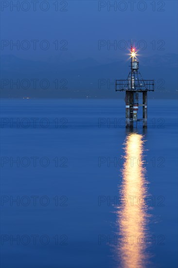 Lighthouse at Hoernle during the blue hour with a stormy atmosphere