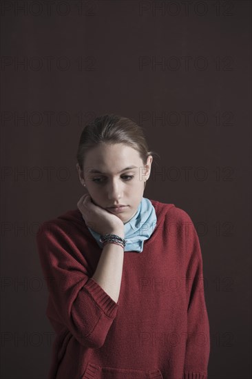 Teenage girl with a thoughtful expression