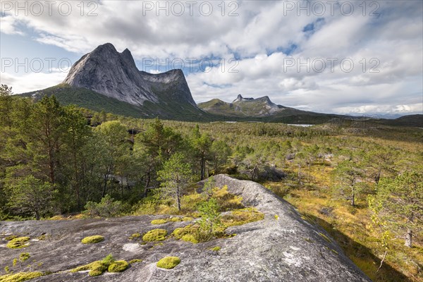 Distinctive mountain peak Stortinden in autumn landscape