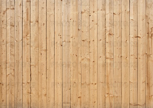 Natural colored wooden wall of rough boards