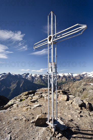 Summit cross on Orgelspitz or Laaser Spitz Mountain above Laas