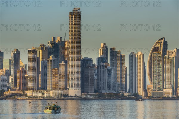 Little boat before the skyline of Panama City
