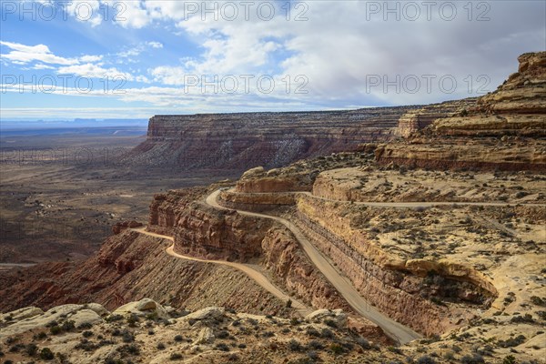 Moki Dugway leads in serpentines through the steep face of the Cedar Mesa