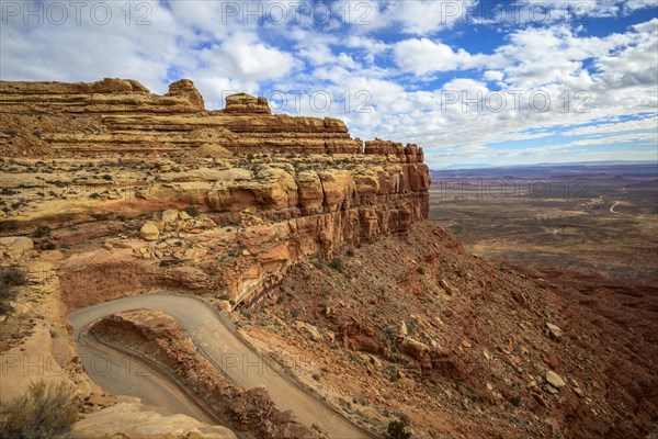 Moki Dugway leads in serpentines through the steep face of the Cedar Mesa