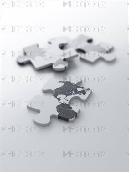 Pieces of a puzzle with a map of the USA