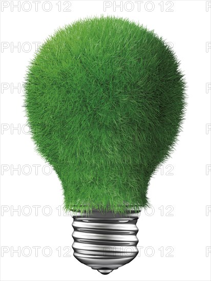 Light bulb covered with grass