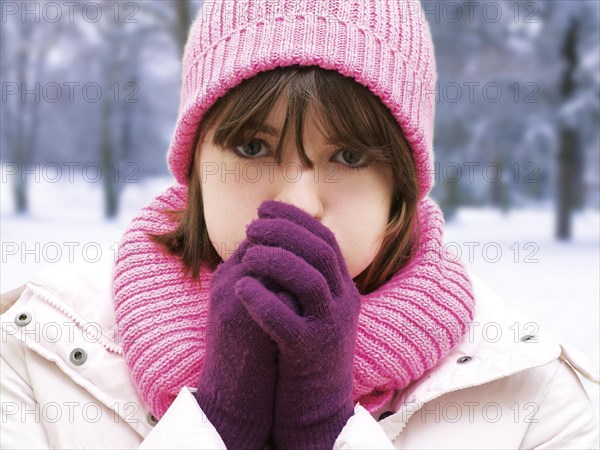 Girl with a pink woolly hat