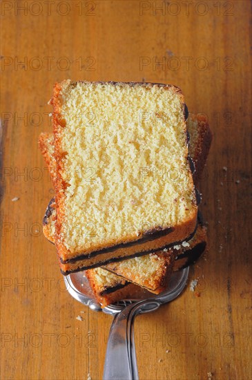 Slices of ring cake on a cake server