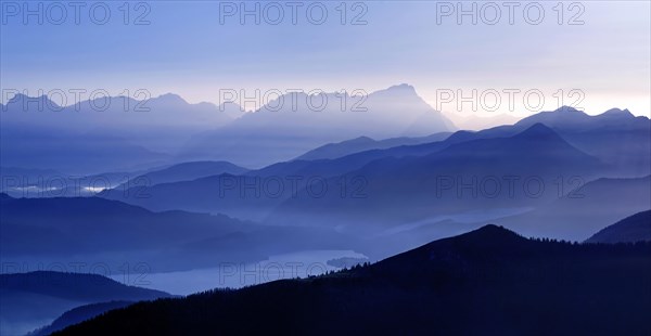 View from the Brauneck on the Jachenau with Walchensee and Zugspitze with Wetterstein range