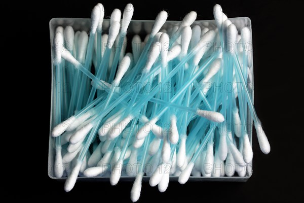 Cotton swab with plastic