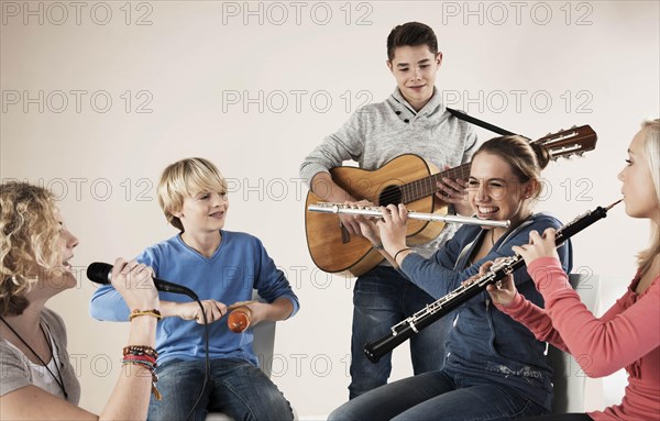 Teenagers making music together