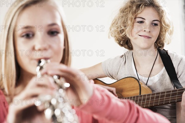 Teenagers making music together