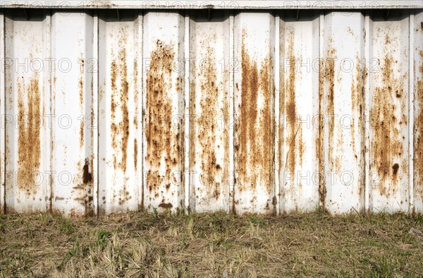 Rusty white coastal protection wall in the Port of Hamburg