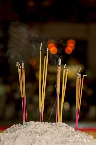 Lit incense sticks