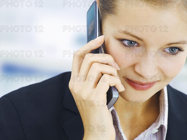 Businesswoman using a phone