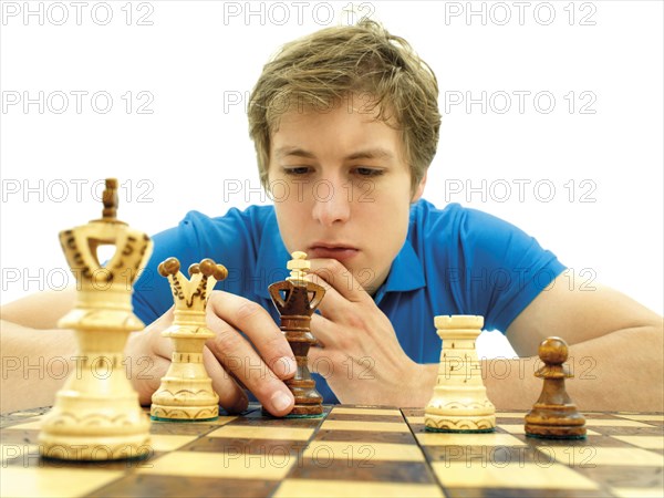 Young man playing chess