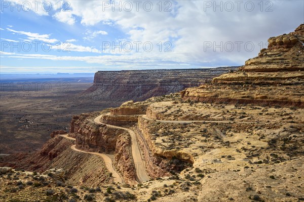 Moki Dugway leads in serpentines through the steep face of the Cedar Mesa